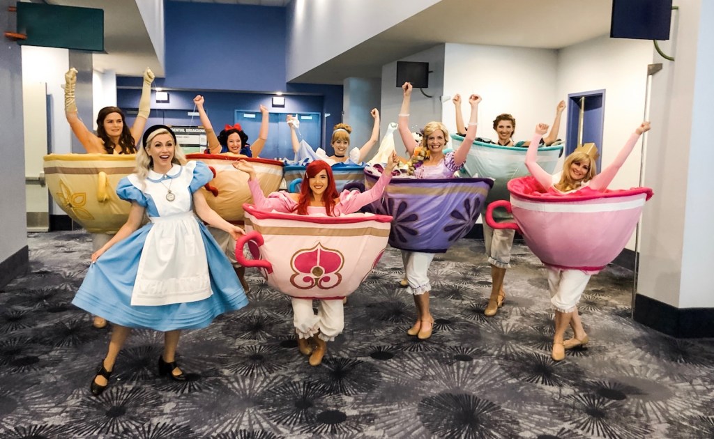 D23 Expo Mousequerade costume contest "Cast of Characters" 2019 winner "Mad Princess Party" transformation teacup dresses